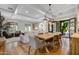 Elegant dining room with hardwood floors and a large wooden table at 10191 E Diamond Rim Dr # 2122, Scottsdale, AZ 85255