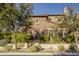 Brick home with landscaping and a welcoming front entrance at 10191 E Diamond Rim Dr # 2122, Scottsdale, AZ 85255