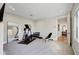 Home gym with elliptical, weights, and mirror at 10191 E Diamond Rim Dr # 2122, Scottsdale, AZ 85255