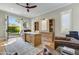 Bright home office with French doors opening to backyard at 10191 E Diamond Rim Dr # 2122, Scottsdale, AZ 85255
