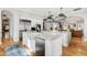 Open kitchen with double islands, marble countertops and stainless steel appliances at 10191 E Diamond Rim Dr # 2122, Scottsdale, AZ 85255