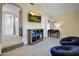 Playroom with two comfy armchairs and a large TV at 10191 E Diamond Rim Dr # 2122, Scottsdale, AZ 85255