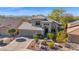 Two-story house with a tile roof, and landscaped yard at 10532 E Firewheel Dr, Scottsdale, AZ 85255