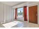 Living room with tiled floors and view of backyard at 11029 W Cherry Hills Dr, Sun City, AZ 85351