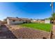 Large backyard with grassy area and storage shed at 11328 E Elton E Ave, Mesa, AZ 85208