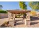 Gazebo with brick pavers and pathway, surrounded by greenery at 13204 W Palo Verde Dr, Litchfield Park, AZ 85340