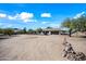 House with a large front yard and gravel driveway at 1739 W Joy Ranch Rd, Phoenix, AZ 85086