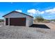 Detached garage with brown double doors at 1739 W Joy Ranch Rd, Phoenix, AZ 85086