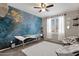 Bedroom with artistic wall covering and relaxing furniture at 18110 N Skyhawk Dr, Surprise, AZ 85374
