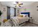 Bright bedroom with a plush bed and stylish decor at 18110 N Skyhawk Dr, Surprise, AZ 85374