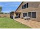 Covered patio with seating area, ideal for outdoor enjoyment at 18110 N Skyhawk Dr, Surprise, AZ 85374