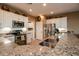 Modern kitchen with stainless steel appliances and granite countertops at 22033 N Arrellaga Dr, Sun City West, AZ 85375