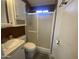 Clean bathroom with shower/tub combo and updated vanity at 2205 W Klamath Ave, Apache Junction, AZ 85119