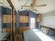 Spacious bedroom with a double bed and mirrored closet doors at 2205 W Klamath Ave, Apache Junction, AZ 85119