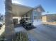 Mobile home exterior with carport and landscaping at 2205 W Klamath Ave, Apache Junction, AZ 85119