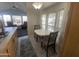 Kitchen nook with small table and chairs, open to living area at 2205 W Klamath Ave, Apache Junction, AZ 85119