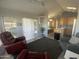 Open concept living room and kitchen with comfortable seating at 2205 W Klamath Ave, Apache Junction, AZ 85119