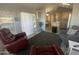 Living room with open floor plan to kitchen, and comfy seating at 2205 W Klamath Ave, Apache Junction, AZ 85119