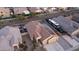 Aerial view showcasing a house with solar panels, RV parking, and a spacious backyard at 22325 N 185Th Ave, Surprise, AZ 85387