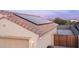 Rooftop solar panels, providing clean energy for the home at 22325 N 185Th Ave, Surprise, AZ 85387