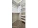 Well-organized closet with shelves and rod at 2233 E Behrend Dr # 117, Phoenix, AZ 85024