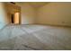 Spacious carpeted bedroom with vaulted ceiling and ample natural light at 24809 S Drifter Dr, Sun Lakes, AZ 85248