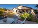 Relaxing backyard patio with seating area and lush greenery at 28320 N Tourmaline Dr, San Tan Valley, AZ 85143