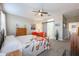 Main bedroom with barn door and carpet flooring at 30080 W Fairmount Ave, Buckeye, AZ 85396