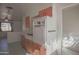 Kitchen with white stove and oven, light wood cabinets at 3338 W Palmaire Ave, Phoenix, AZ 85051