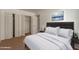 Bedroom with a bed, dresser, and large closet at 3605 W Bethany Home Rd # 21, Phoenix, AZ 85019