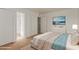 Main bedroom with a dresser and ocean-themed artwork at 3605 W Bethany Home Rd # 21, Phoenix, AZ 85019