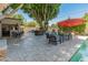 Spacious backyard with pool, spa, outdoor kitchen, and ample seating at 5524 N 3Rd Ave, Phoenix, AZ 85013