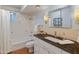 Updated bathroom with granite countertop and tiled shower at 5524 N 3Rd Ave, Phoenix, AZ 85013