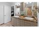 Double vanity bathroom with glass block shower and tile flooring at 5524 N 3Rd Ave, Phoenix, AZ 85013