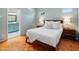 Bright bedroom with hardwood floors and ensuite bathroom at 5524 N 3Rd Ave, Phoenix, AZ 85013