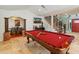 Game room with pool table, hardwood floors, and access to stairs at 5524 N 3Rd Ave, Phoenix, AZ 85013
