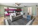 Spacious Gathering room with sectional sofa and ceiling fans at 5524 N 3Rd Ave, Phoenix, AZ 85013