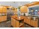 Eat-in kitchen with stainless steel appliances and island at 5524 N 3Rd Ave, Phoenix, AZ 85013
