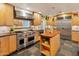 Updated kitchen, stainless steel appliances and wood cabinetry at 5524 N 3Rd Ave, Phoenix, AZ 85013
