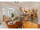 Bright kitchen, stainless steel appliances, island, and hardwood floors at 5524 N 3Rd Ave, Phoenix, AZ 85013