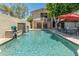 Relaxing pool area with fountain and patio furniture at 5524 N 3Rd Ave, Phoenix, AZ 85013