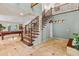 Elegant wooden staircase with wrought iron railings at 5524 N 3Rd Ave, Phoenix, AZ 85013