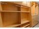 Bright walk-in closet with built-in shelves and drawers at 5524 N 3Rd Ave, Phoenix, AZ 85013