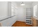 Large walk-in closet with ample shelving and hanging space at 5524 N 3Rd Ave, Phoenix, AZ 85013
