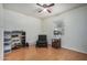 Well-lit bedroom with wood floors and window at 6214 N 10Th St, Phoenix, AZ 85014