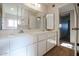 Bathroom with double vanity and access to bedroom at 7615 N 46Th Ave, Glendale, AZ 85301