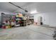 Garage with storage shelving and ample space at 8244 W Willow Ave, Peoria, AZ 85381