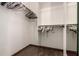 Walk-in closet with ample hanging space and shelving at 12742 W Ash St, El Mirage, AZ 85335