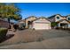 One-story house with a pink garage door and a well-maintained front yard at 12742 W Ash St, El Mirage, AZ 85335