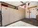 Garage with ample storage cabinets and space for two cars at 12742 W Ash St, El Mirage, AZ 85335